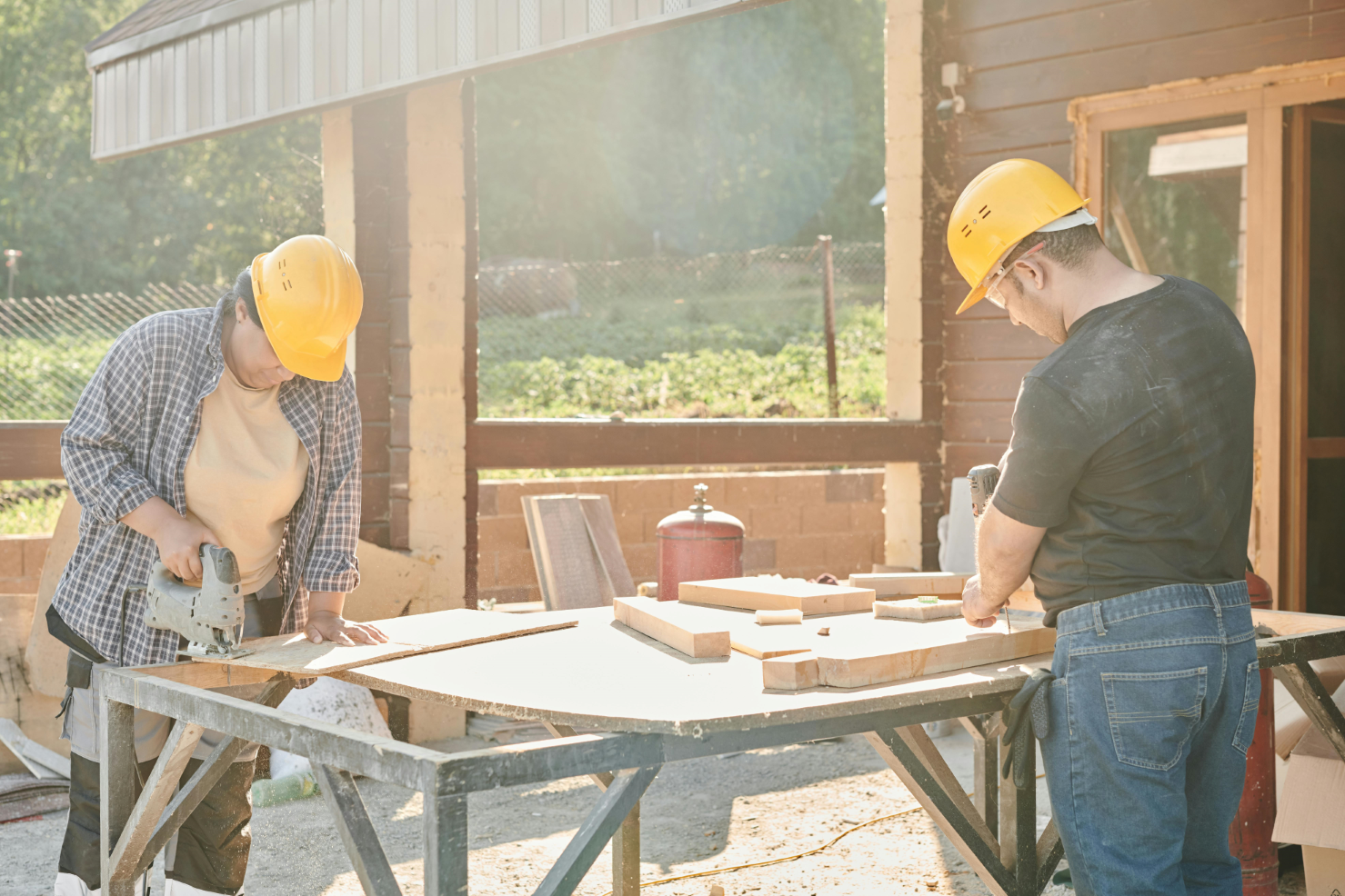 Photo by Mikael Blomkvist: https://www.pexels.com/photo/man-and-woman-in-yellow-hard-hats-working-using-industrial-tools-8961336/