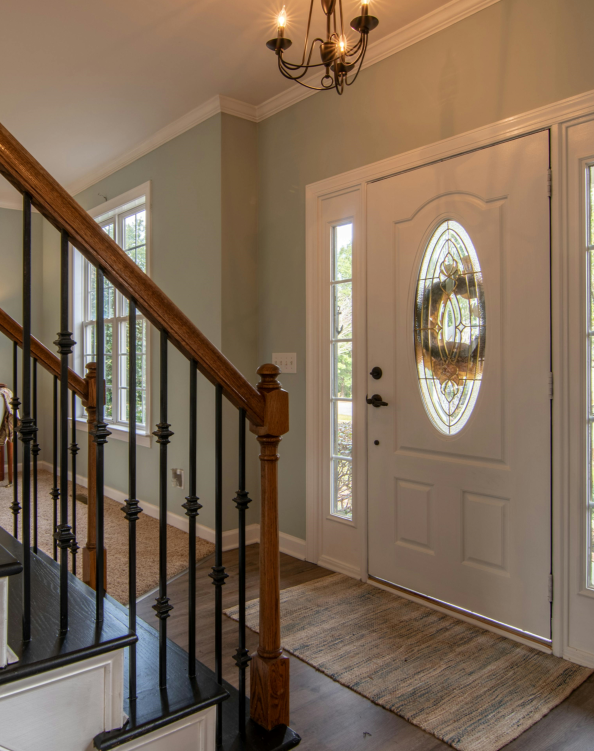 Photo by Curtis Adams: https://www.pexels.com/photo/brown-wooden-staircase-with-brass-chandelier-3288103/